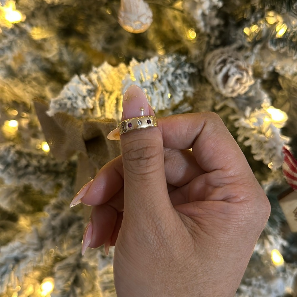 15K (marked) rose gold, gypsy ring with 2 rubies and 1 diamond